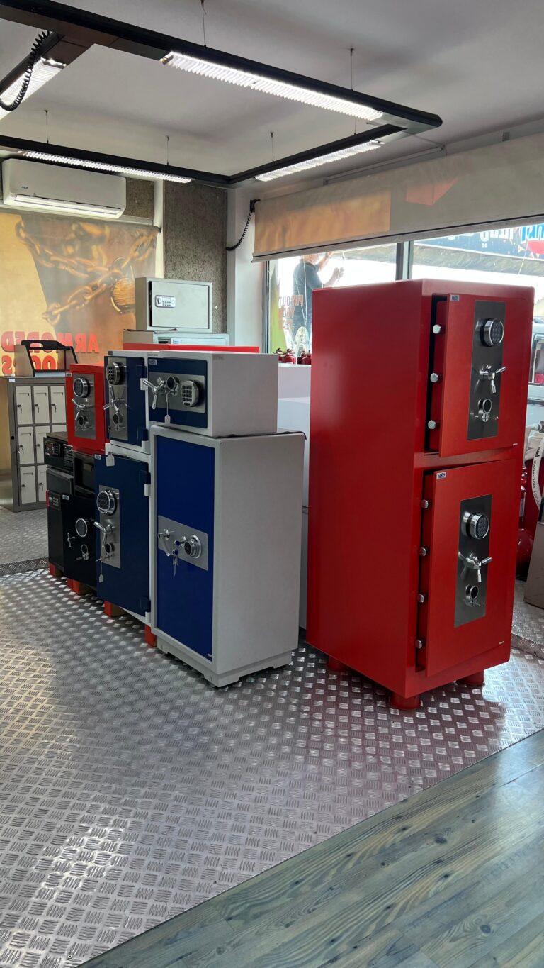 Closed blue and red safes in a secure storage system for home and office protection